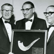 Max Fisher holding his award with Rabbi Maurice N. Eisendrath, president of the American Hebrew Congregations, and Industrialist Lester Avnot.